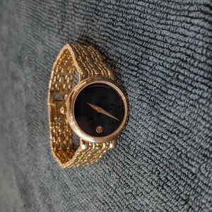Movado Women's Watch with Gold-tone and Black Dial.